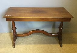A Victorian walnut centre table