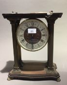 A brass mounted mantle clock