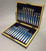 A Victorian cased set of mother-of-pearl handled silver plate cutlery