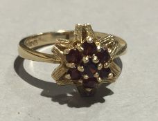 A 9 ct gold garnet cluster ring (2.