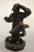 A Chinese carved wooden model of a monkey deity