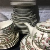 A matched Indian tree part dinner and tea service