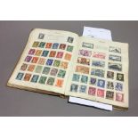 A stamp album and contents,
