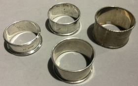 Four silver napkin rings