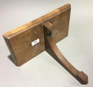 A Victorian wooden wall bracket