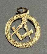 A 9 ct gold Masonic pendant (2.