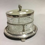 An Elkington and Co silver plate mounted cut glass biscuit barrel