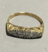 An 18 ct gold and platinum diamond ring (3 grammes all in)