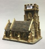 A ceramic model of a church