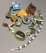 A collection of vintage brooches