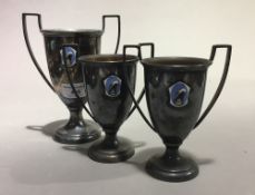 Three silver plated trophies,