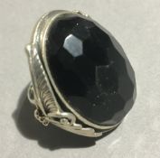 A silver dress ring