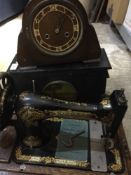 A Singer sewing machine and two clocks (a/f)