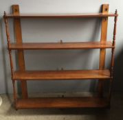 A set of Victorian mahogany hanging shelves