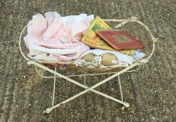 A Victorian dolls cot and a small quantity of childrens books