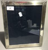 A hallmarked silver photo frame