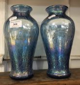 A pair of Art glass blue lustre vases