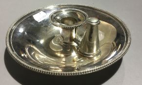 An Elkington and Co silver plated chamber stick