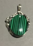 A silver and malachite pendant