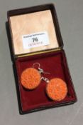 A pair of chrysanthemum and silver earrings