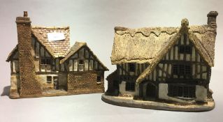 Two ceramic model cottages