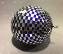 A vintage mirrored hanging disco ball