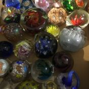 A large collection of paper weights