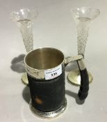 A silver plated tankard and two bud vases