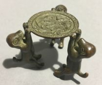 A small Chinese bronze stand,
