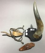 A 'Ring The Horn' cow horn and a taxidermy Cayman keyring