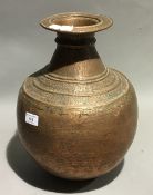 An Eastern copper vase