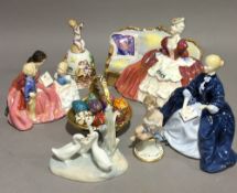 A collection of Royal Doulton figurines and a small quantity of decorative china