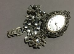 A silver and marcasite lady's watch