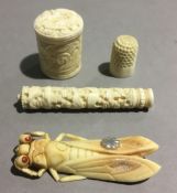 A small quantity of early 20th century carved ivory and a brooch