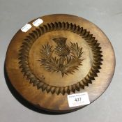 A carved wood shortbread mould,