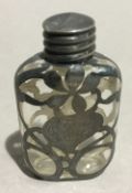 A silver overlay scent bottle