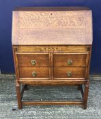 An early 20th century oak bureau