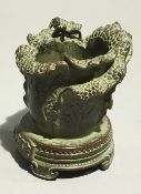 A small Chinese bronze vase formed as a cabbage