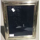 A hallmarked silver photo frame