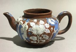 A 19th century Chinese enamel decorated teapot