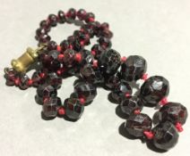 A facet cut bead necklace,