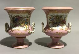 A pair of pink ground porcelain vases