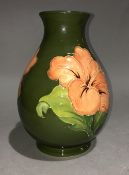 A Moorcroft Hibiscus pattern vase