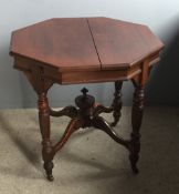 A late Victorian walnut octagonal centre table
