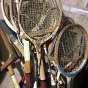 A large quantity of vintage tennis rackets