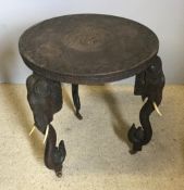 A Burmese carved hardwood elephant table