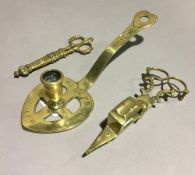 An 18th century style brass chamberstick, etc.