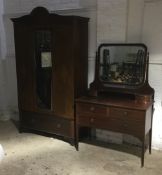 An Edwardian inlaid mahogany wardrobe and dressing table