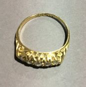 An 18 ct gold diamond set ring (2.