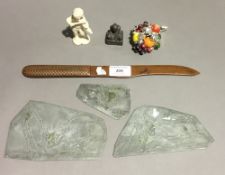 A small quantity of miscellaneous items, including a letter opener, printing plates,